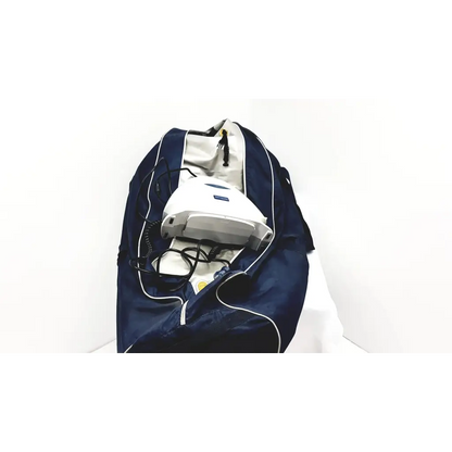Navy blue and white sports duffel bag with gray arjo-huntleigh 630003 auto logic pressure pump inside