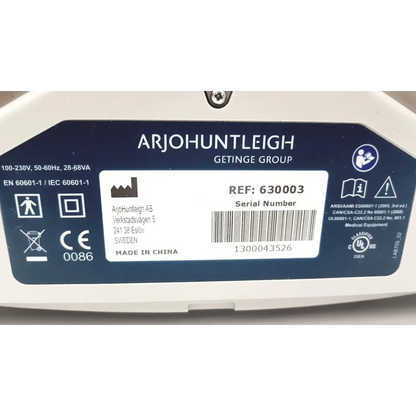 White arjo-huntleigh auto logic pressure pump with dark blue label and regulatory markings for alternating pressure therapy