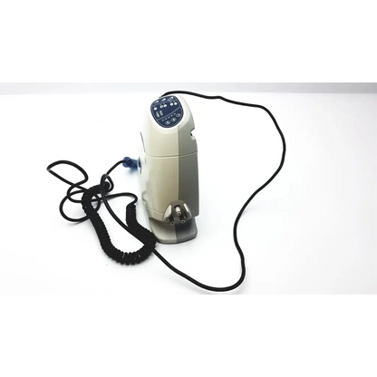 Beige and gray arjo-huntleigh auto logic pressure pump with digital panel and coiled power cord pressure pump