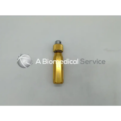 Gold-colored hexagonal arthrex ar-1415 cannulated jacobs chuck handle with silver cap for secure tool attachment