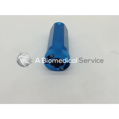 Blue metallic cylindrical medical instrument with textured grip and central opening arthrex ar-1927 ad5=607 box=11