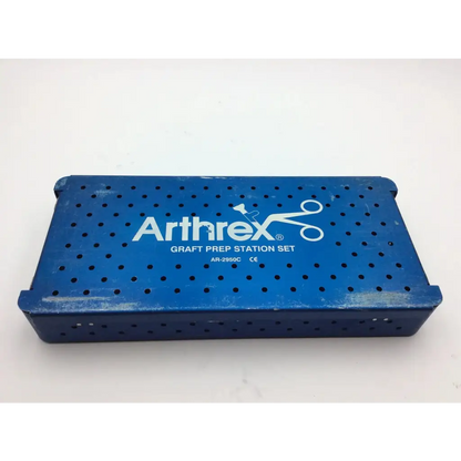 Blue perforated metal arthrex graft prep station set box for efficient graft prep and secure instrument organization
