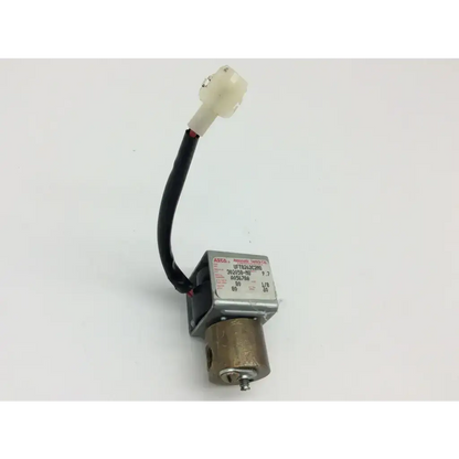 Asco uft8262c2mo silver and black solenoid valve with white plastic connector on black wire for precise control