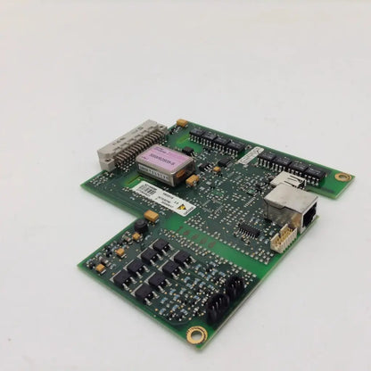 Green printed circuit board with black integrated circuits pink label and silver connectors for ascom a21a9596 converter board