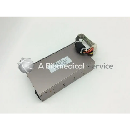 Silver metallic asp sterrad nx 40-53104-001 rev c power supply with spherical component and attached wiring for power use