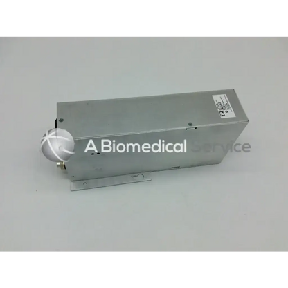 Silver metallic rectangular asp sterrad nx power supply with circular component and label on the side model 40-52154-001 rev g