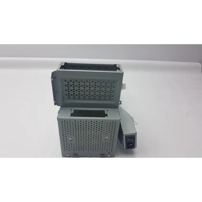 Gray metal astec aa23900l 422w power supply with perforated side panels and black ac input plug showing main pca board