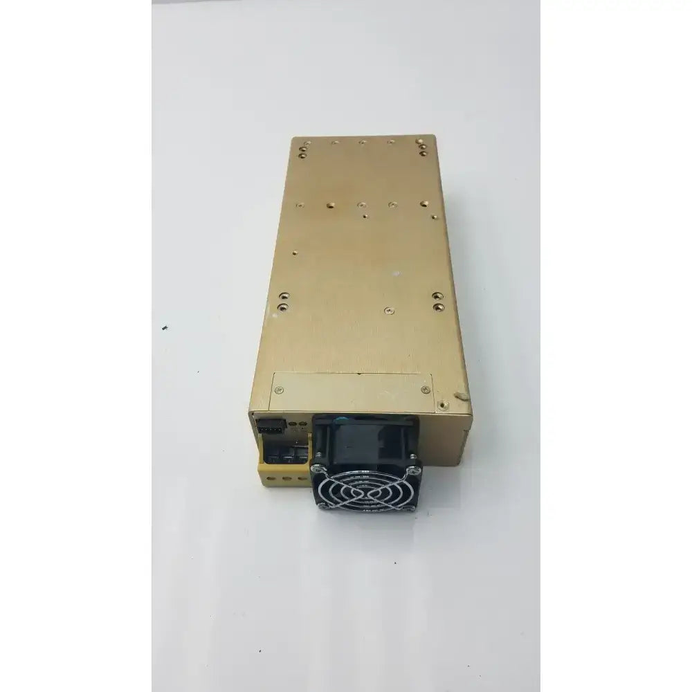 Gold-colored metal modular power supply unit astec mp6-3l-4nn-0m with black cooling fan for efficient modular power