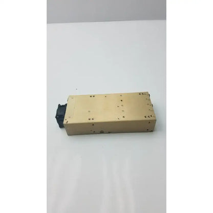Gold-colored Astec MP6-3L-4NN-0M modular power supply with black connector for efficient modular power use