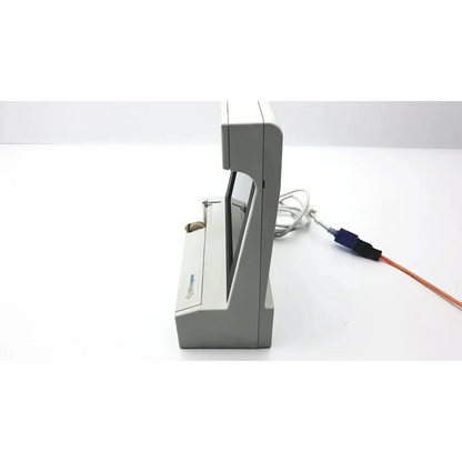 Gray plastic crt monitor with curved screen and input cables of audioscan verifit model vf-1 hearing aid analyzer