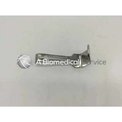 Silver metallic austos us100201 abdominal retractor with curved l-shaped design and flat base for stable placement