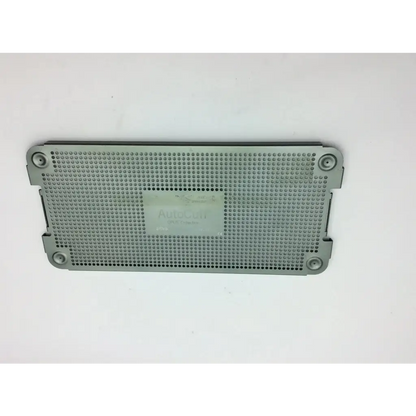 Gray metallic mesh panel with perforated surface and corner screws on back of autocuff opus collection shoulder instrument case