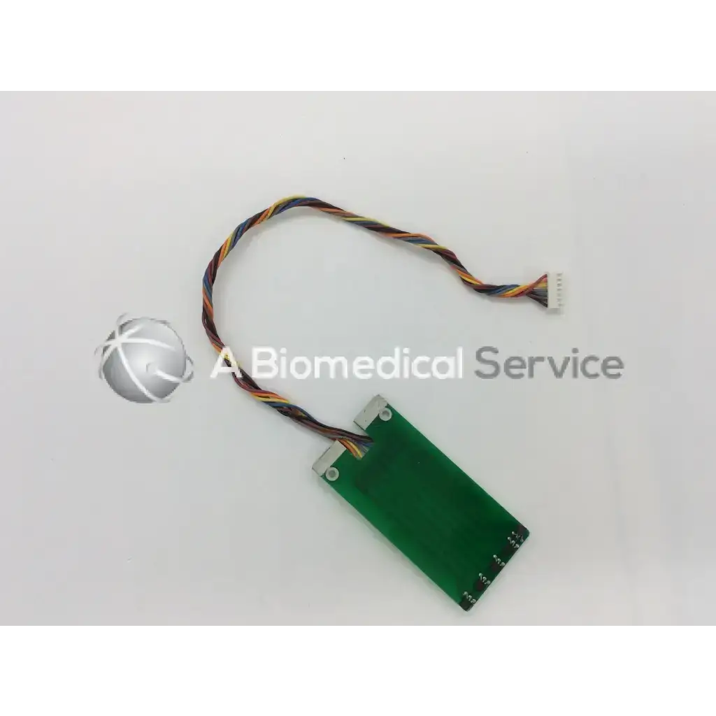 Green rectangular cassette id board with multi-colored twisted cable and white connector for datex anesthesia machine