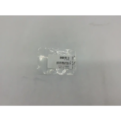 A clear plastic bag containing a white label with barcode for lockscrew ad5-319 121322sm product axS 56-17506