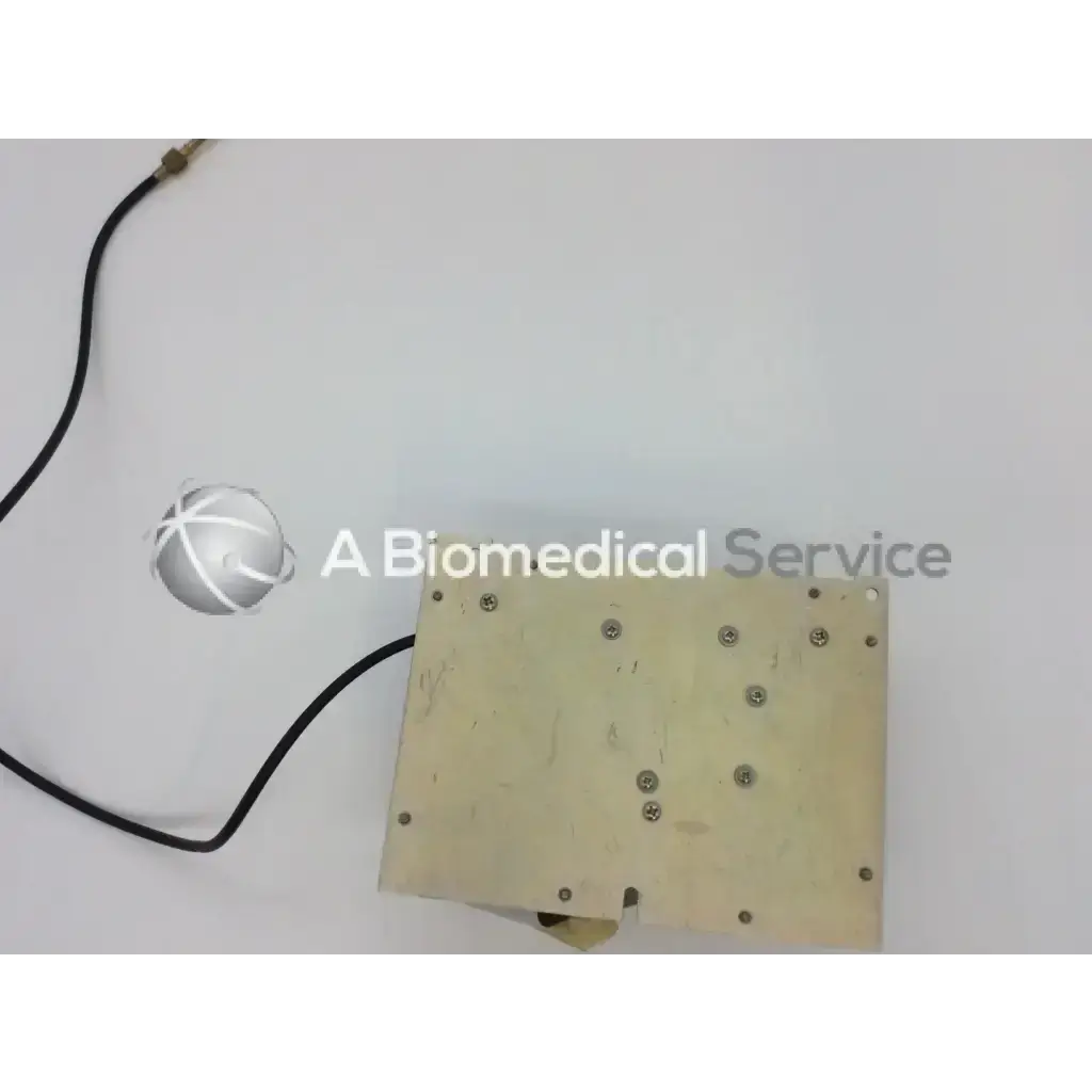 Beige rectangular b119849 horiba spectrometer backside with silver screw grid and connected black cable bbcf5-3 model