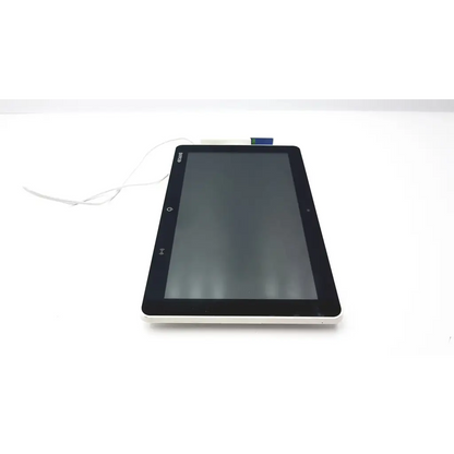 Black and white barco ja018 smart terminal with sleek rectangular design and bedside multi-touch screen display