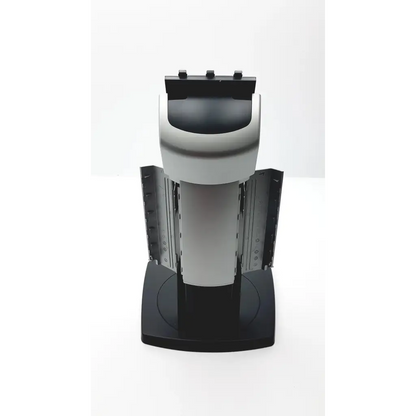 Black and silver barco single head stand coronis k9302030a with adjustable arms for ergonomic monitor support