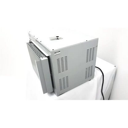 Silver metallic barnstead muffle furnace f62735 with vented side panel and power cord extending from base shown from back
