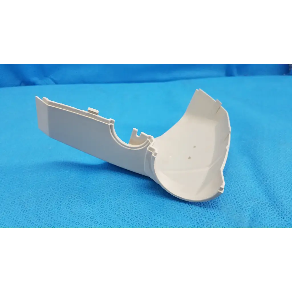 White plastic base arm joint cover housing right side with curved u-shaped gutter guard and interlocking tabs for topcon retinal camera