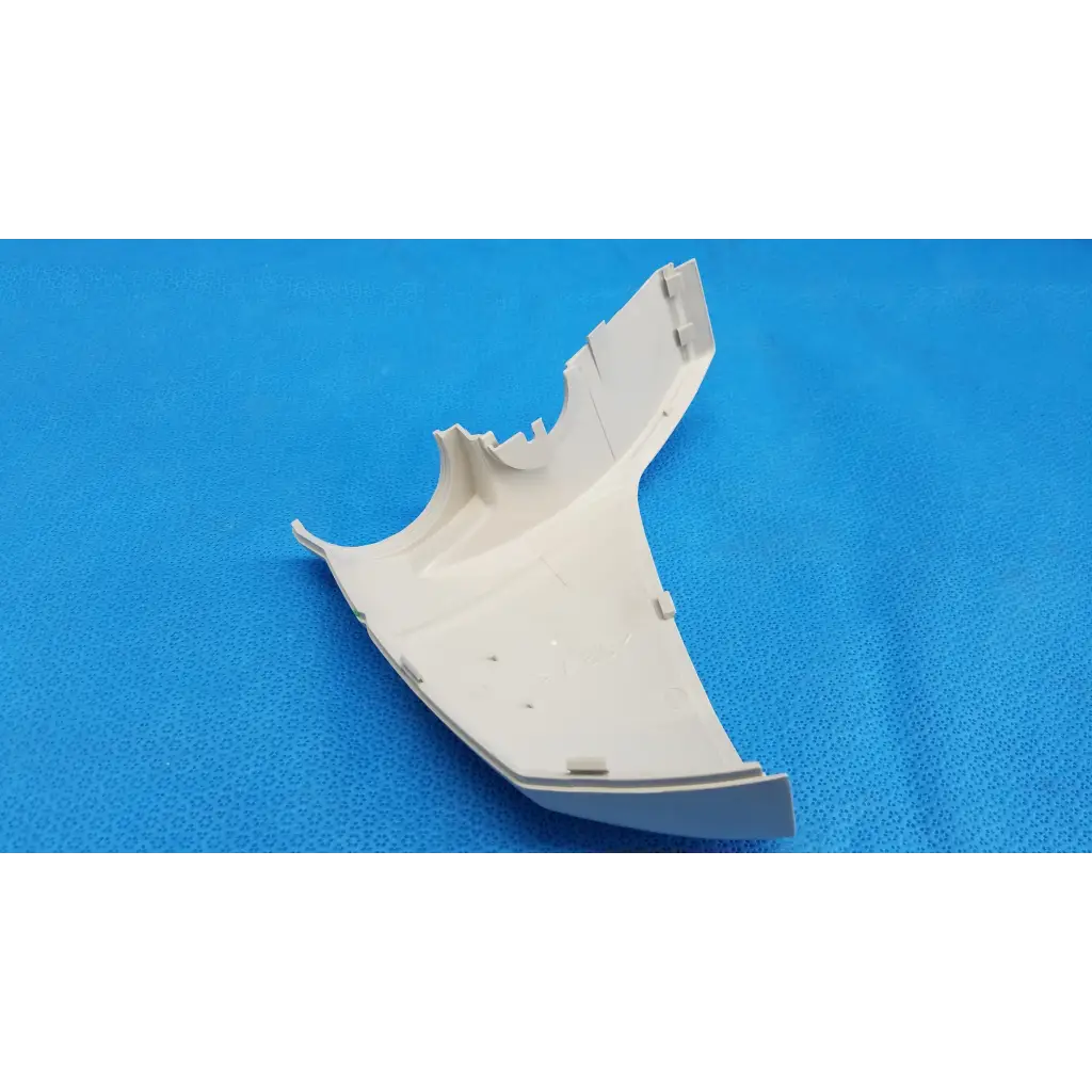 Off-white plastic base arm joint cover housing right side with molded tabs and mounting points for topcon retinal camera
