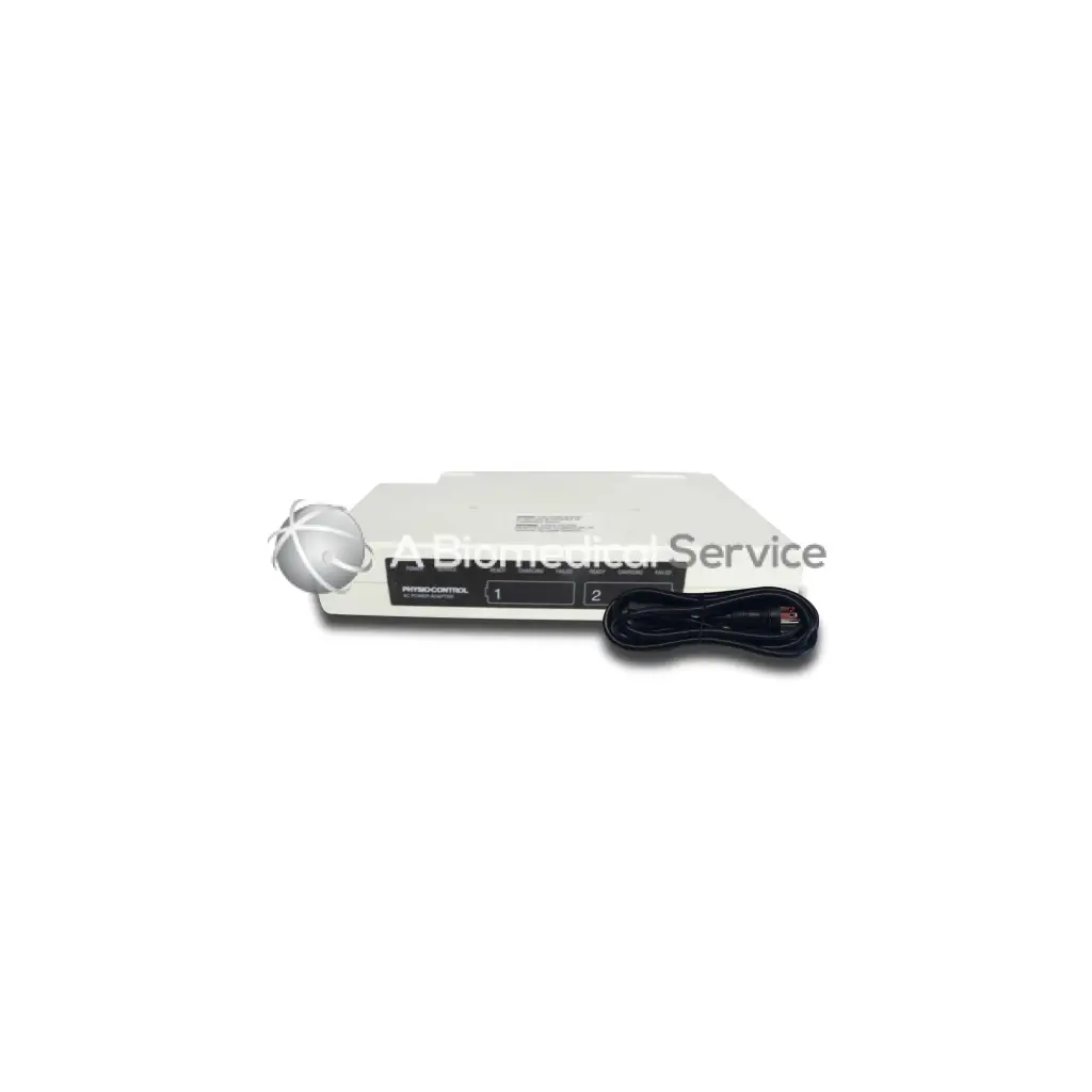 White rectangular battery support system 2 medical device labeled rhythm control with two ports and coiled black cable for biomedical service