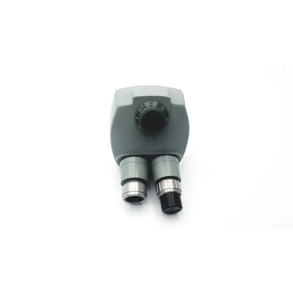 Gray metallic Bausch & Lomb 0.7X-3X microscope head stereozoom turret with dual eyepiece tubes and central focus dial