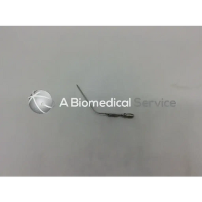 A metallic bausch n1698 schuknecht suction tube with a curved slender shaft and pointed tip 24 gauge