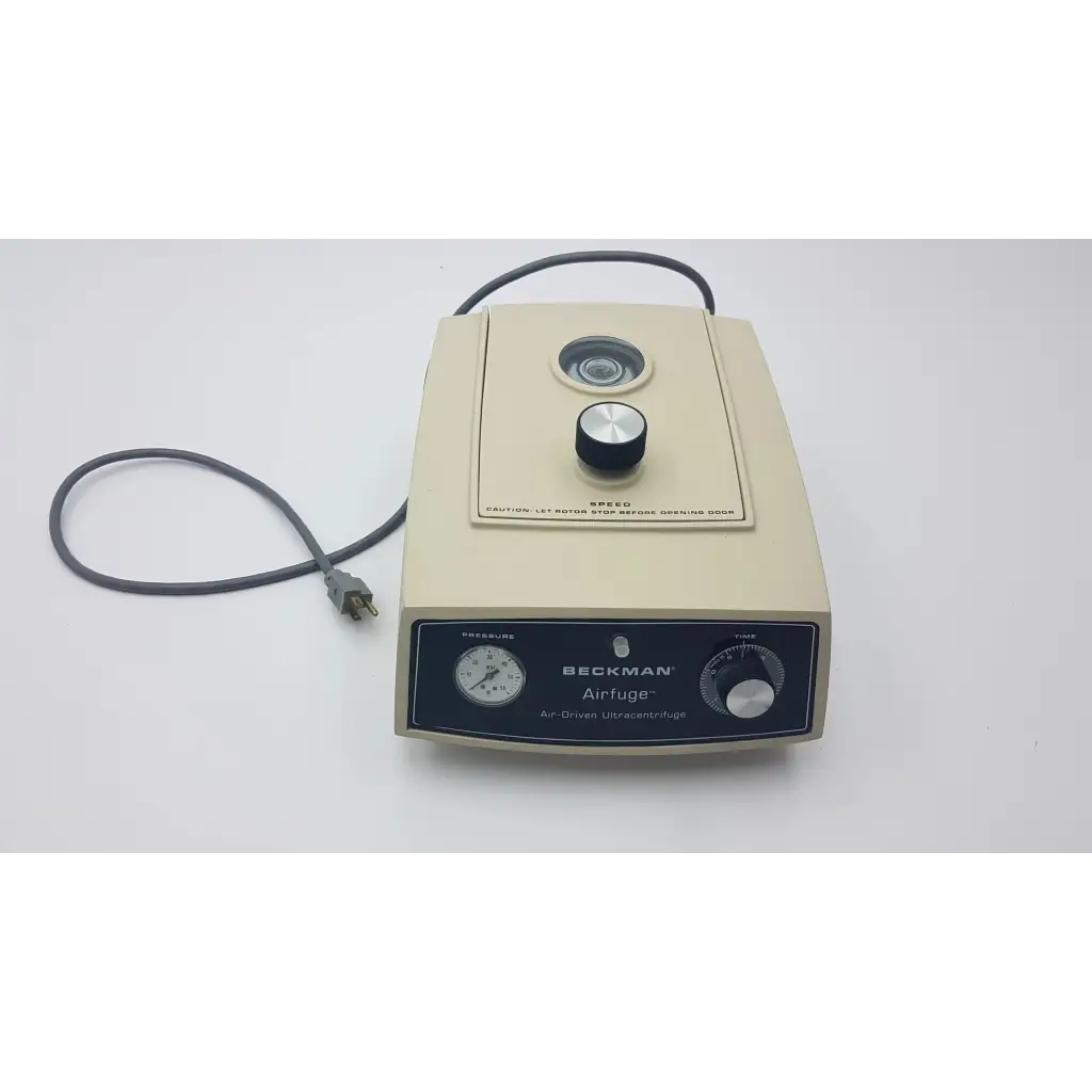 Beige beckman airfuge air-driven ultracentrifuge 340400 with black control knobs and dials for laboratory use