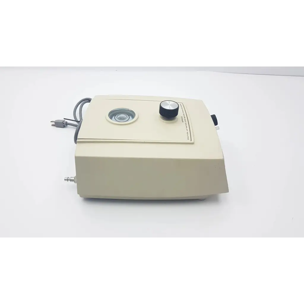 Beige rectangular dental handpiece with circular lens and black knob for beckman airfuge air-driven ultracentrifuge model 340400