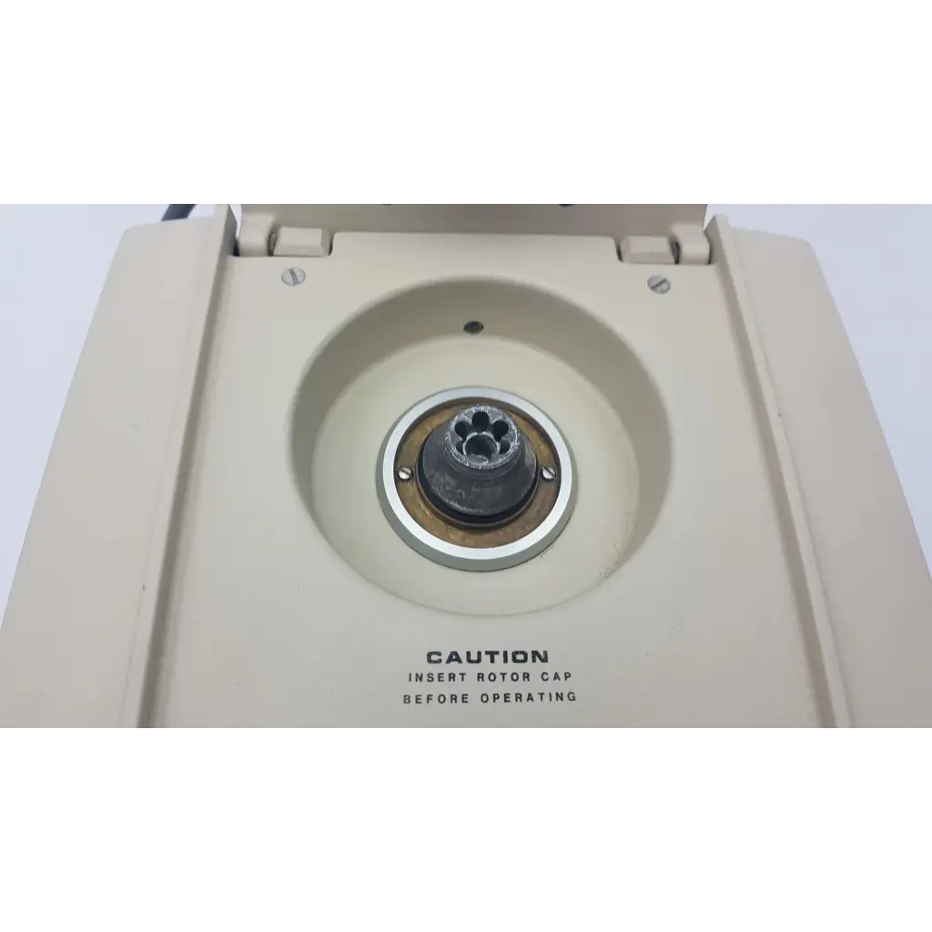 Beckman Airfuge air-driven ultracentrifuge with beige plastic body silver metal rotor cap and black central hub
