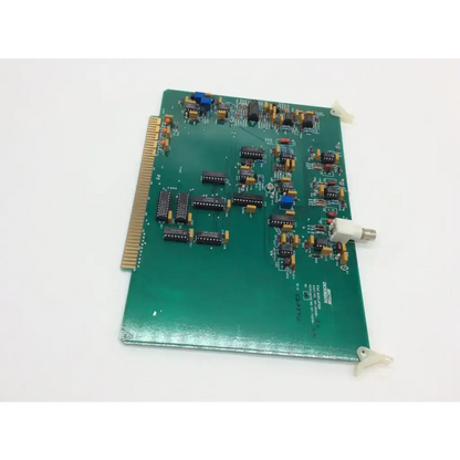 Green printed circuit board with gold edge connector and electronic components in becton dickinson fsc amplifier rev C