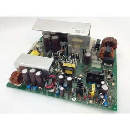 Green printed circuit board with capacitors inductors and silver heat sink bellinx g0289p01a orn PbF board