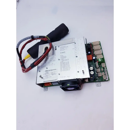 Silver industrial benning 46393 bocholt power supply with black cable and red wiring on green nibp assembly board