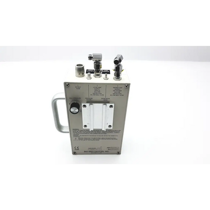Silver metallic medical gas flow meter with labeled ports and handle for devices bmd ic-2a vent system