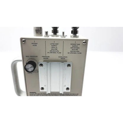 Silver medical gas regulator with labeled ports for patient nose and gas supply on devices bmd ic-2a vent system