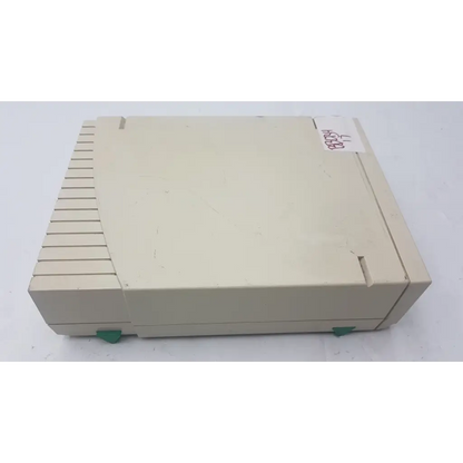 Beige plastic bio-rad powerpac 300 electrophoresis power supply with green feet and slatted side panel