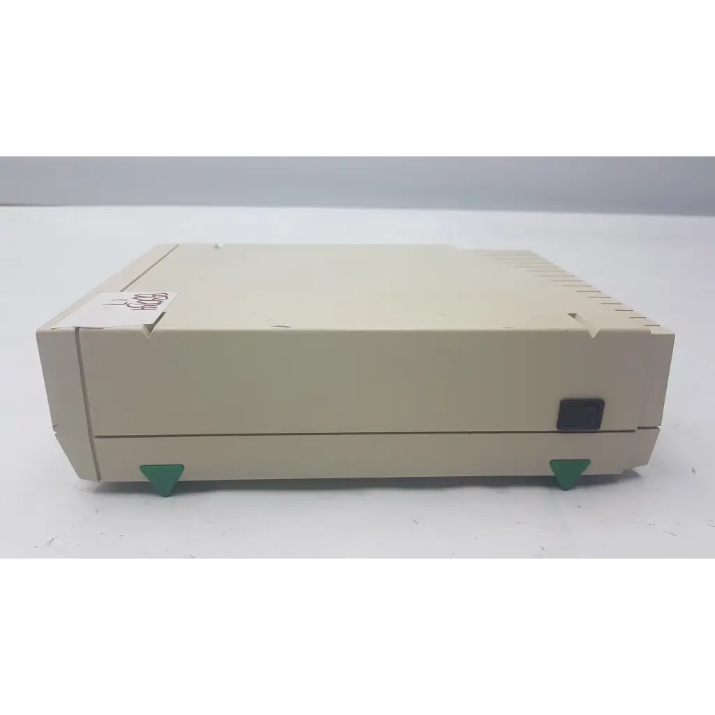 Beige plastic Bio-Rad PowerPac 300 electrophoresis power supply with green triangular feet and black side port