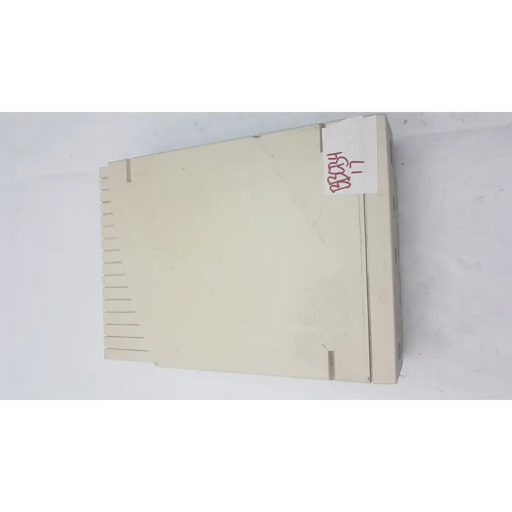 Beige plastic bio-rad powerpac 300 electrophoresis power supply with vertical ventilation slots and handwritten label on top edge