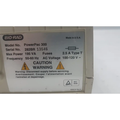 Beige plastic bio-rad powerpac 300 electrophoresis power supply with white label showing technical specs and safety warnings