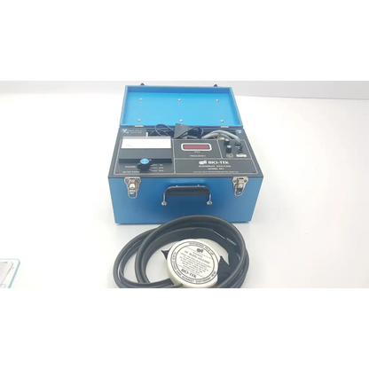 Blue hard-shell carrying case with bio-tek 901 diathermy analyzer ad5-21 featuring black panel red digital display and probe
