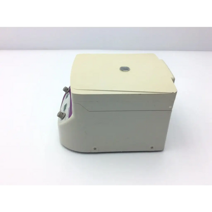 Beige bioexpress spinmate microcentrifuge c0265-isc with a curved base and purple-accented control panel for lab use