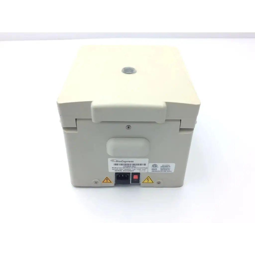 Beige bioexpress spinmate 24 microcentrifuge c0265-isc with hinged lid and power input ports visible from the back side