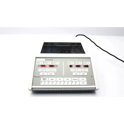 Silver rectangular audio mixing console with labeled buttons and dual display screens for coagulation analyzer 069xm0486