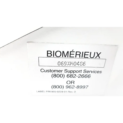 White paper label with black printed text for biomeer coagulation analyzer 069xm0486 model xm back side
