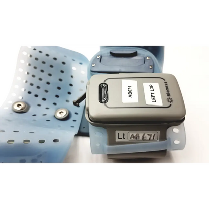 Gray bioness l300 plus l3p left leg brace with light blue perforated silicone straps and thigh cloth electrodes