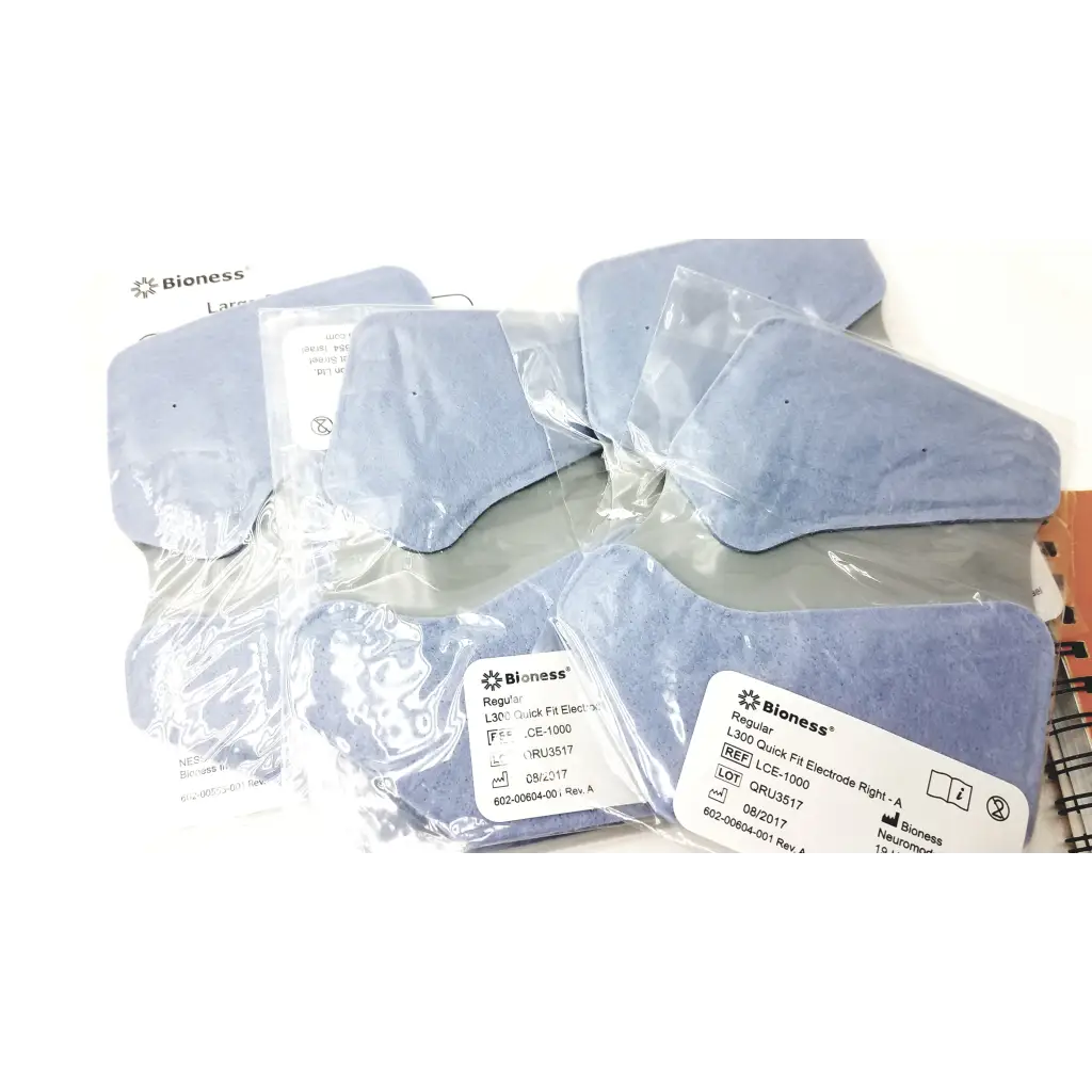 Light blue bioness l300 plus quick fit thigh cloth electrodes in clear plastic packaging for easy use