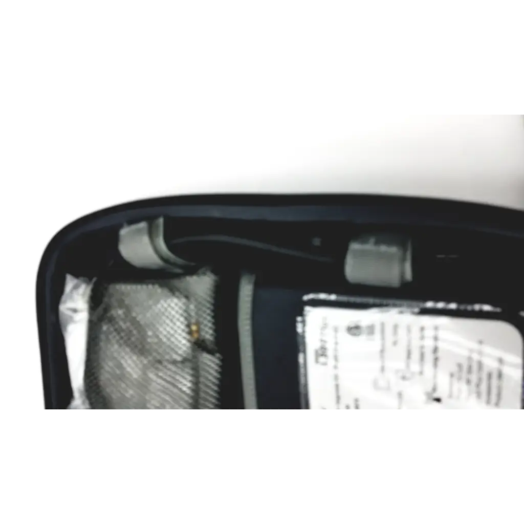 Black interior of bioness l300 plus thigh cloth electrodes mirror housing with silver reflective and gray plastic parts