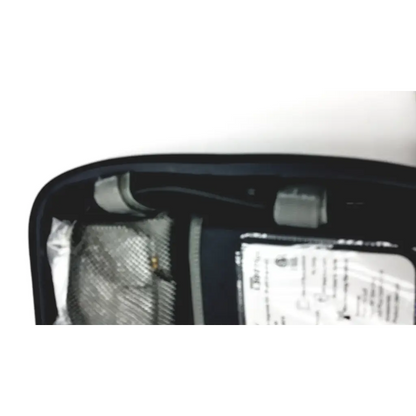 Black interior of bioness l300 plus thigh cloth electrodes mirror housing with silver reflective and gray plastic parts