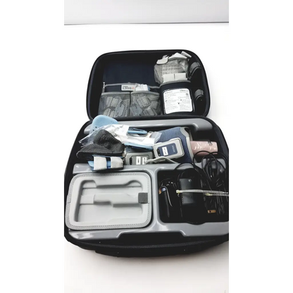 Black and gray travel case with bioness l300 plus thigh cloth electrodes medical equipment inside