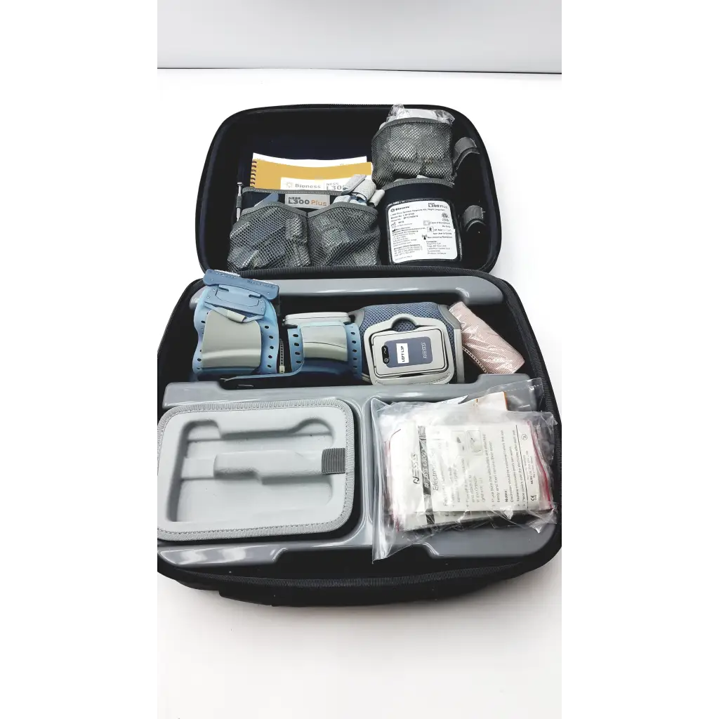 Black neoprene travel case with medical supplies and blue gray insulin pump for bioness l300 plus thigh cloth electrodes
